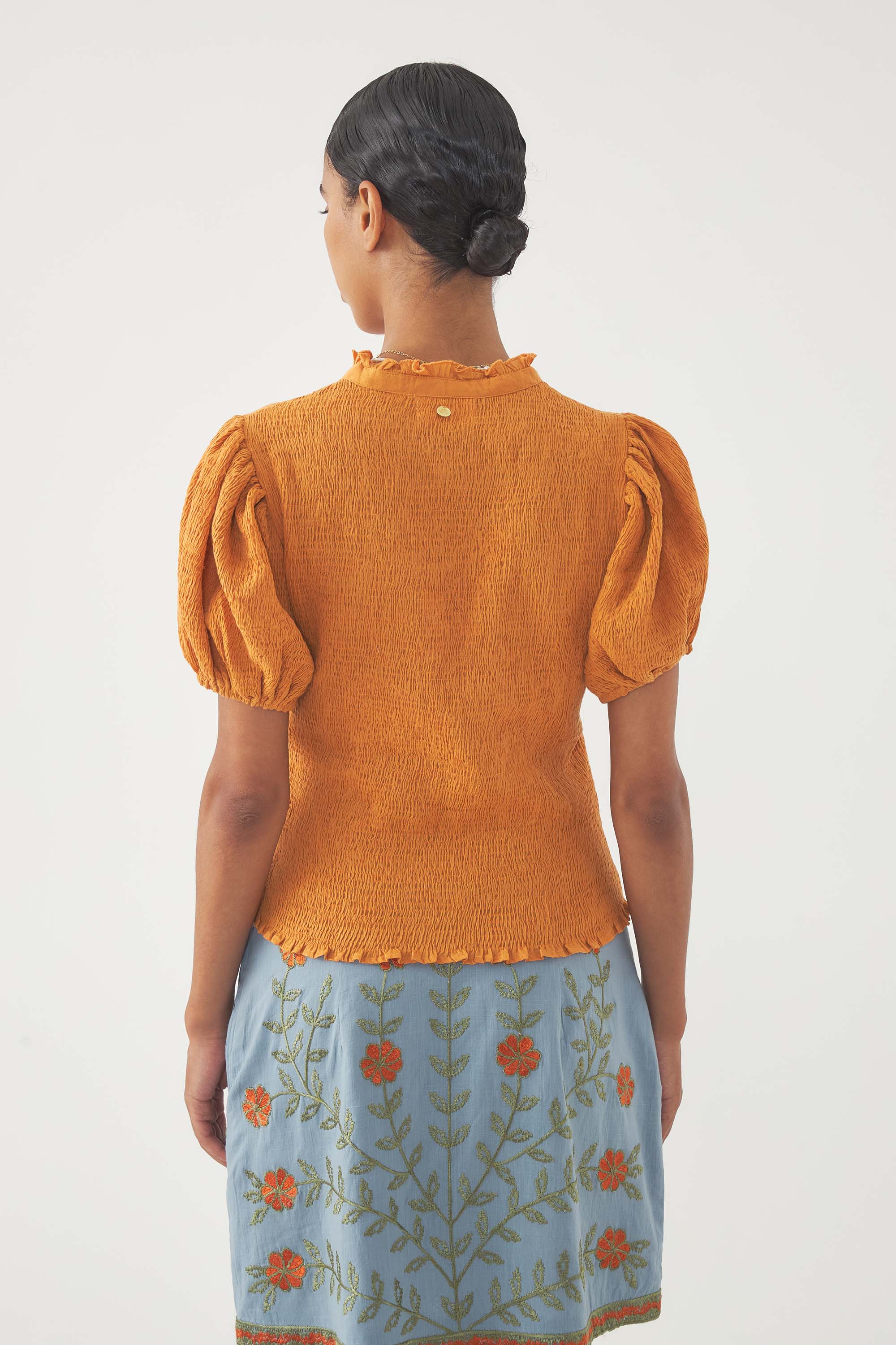 Blusa con smock Angelo
